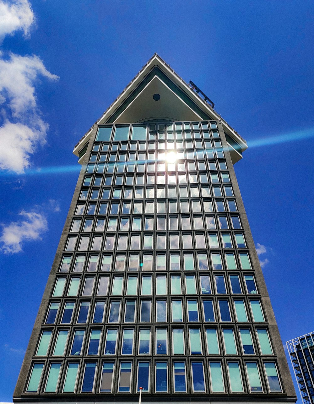 blue glass high-rise building