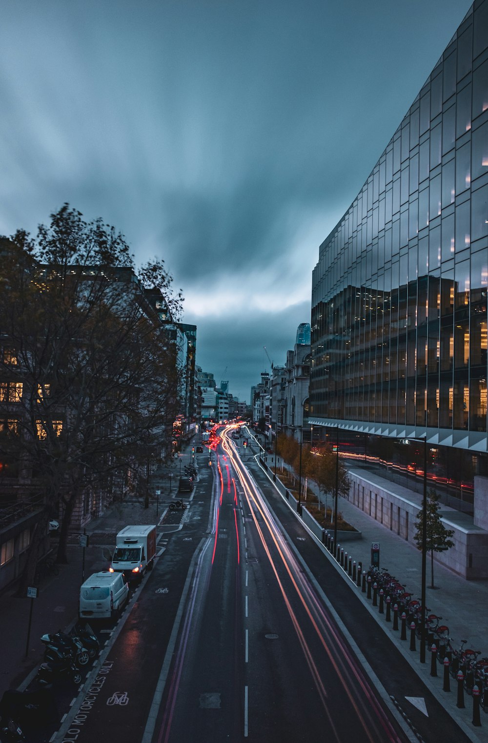 time-lapse photography of different vehicles on road during night time