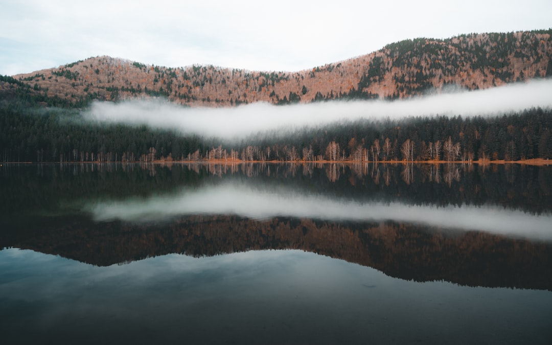 hills beside lake