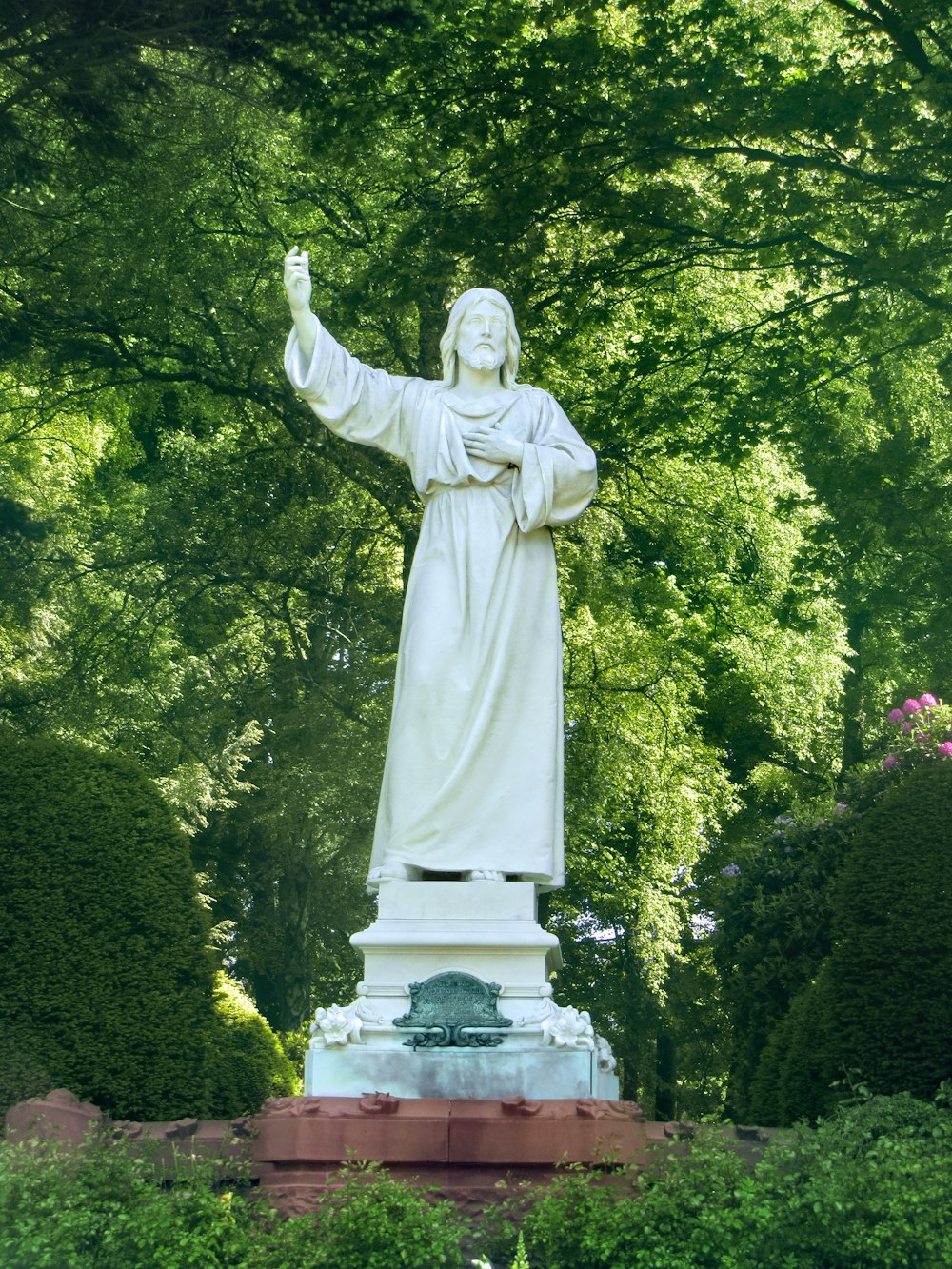 Jesus Christ statue in forest