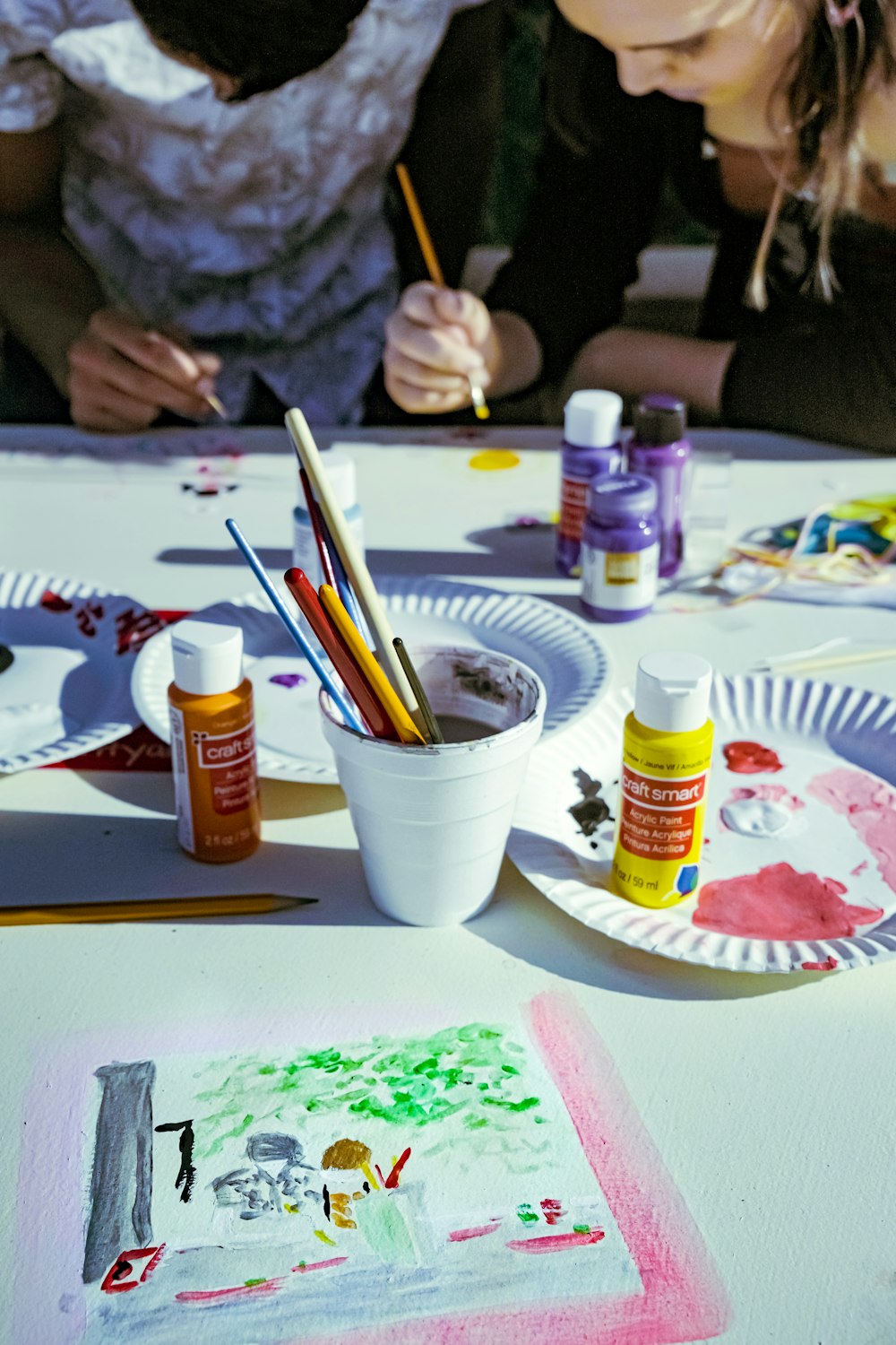 paper plates and cup on table