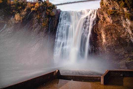 waterfalls at daytime in Parc de la Chute-Montmorency Canada