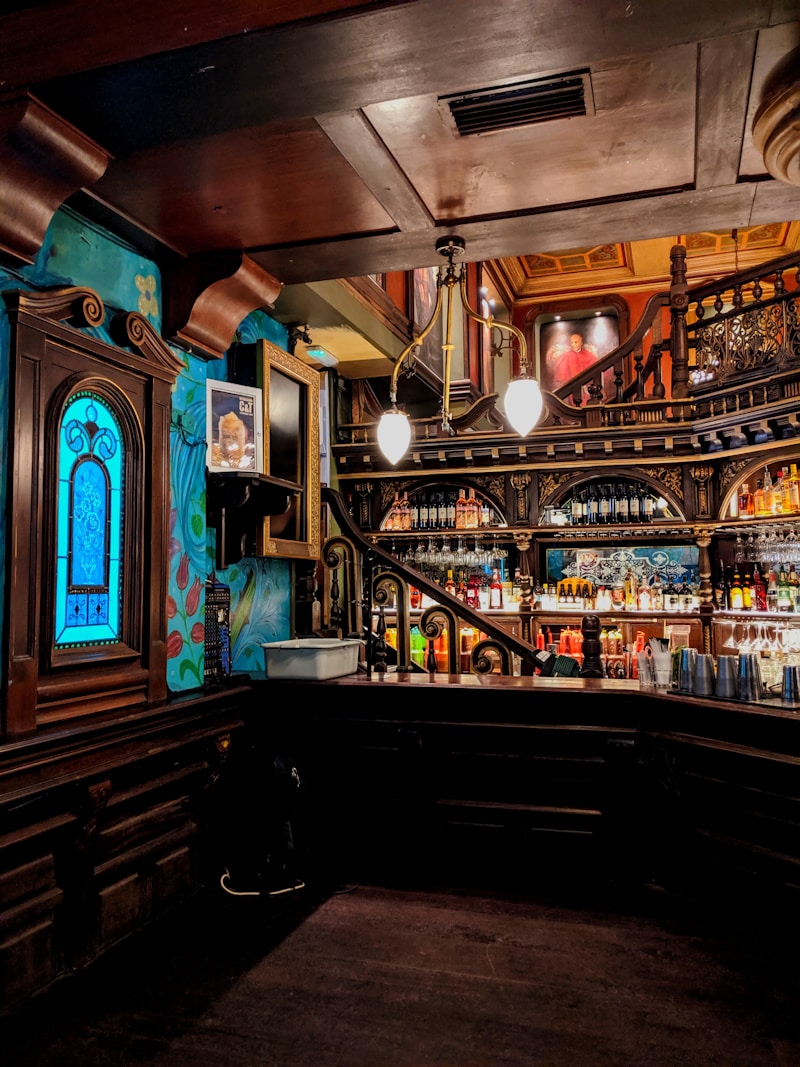 Craftsman-built custom wine cellar interior with warm lighting