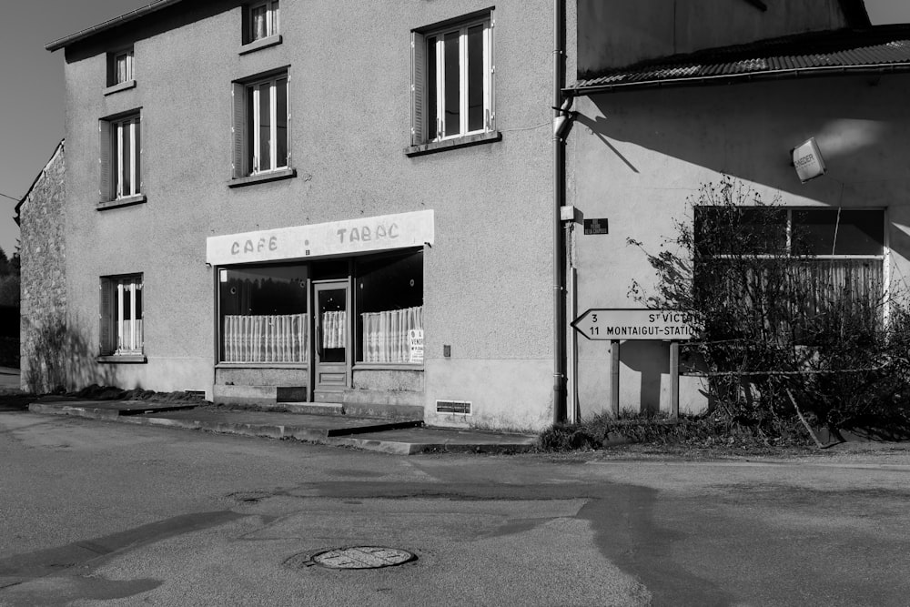 grayscale photography of concrete building