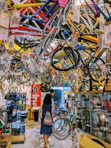 A friendly staff member assisting a customer with bike inquiries.