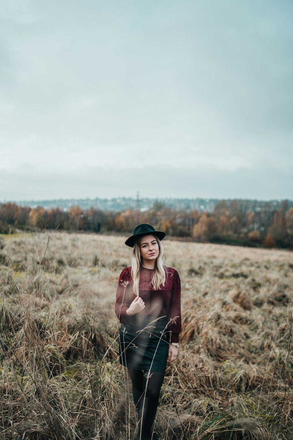 woman in grass field