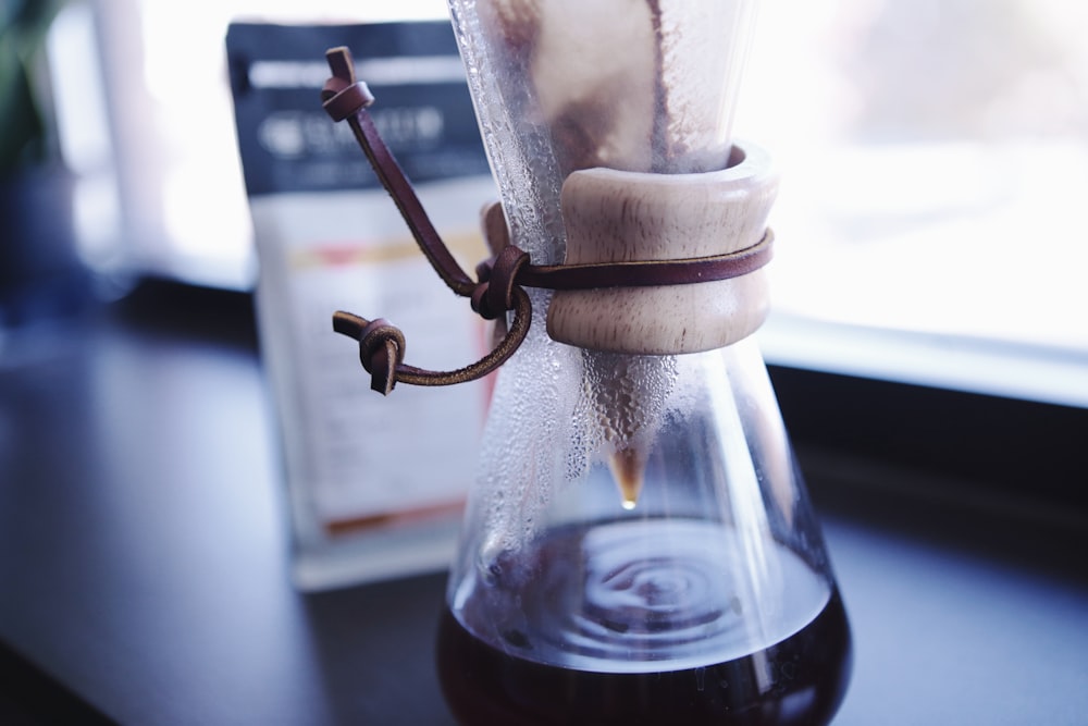 clear container of liquid with filter