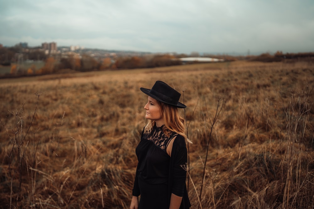 woman standing on grass field