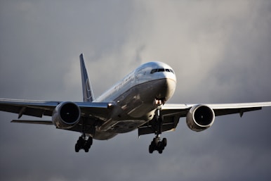 gray airplane in mid air