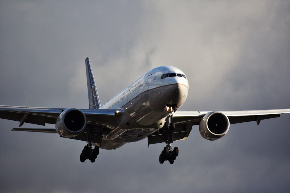 gray airplane in mid air