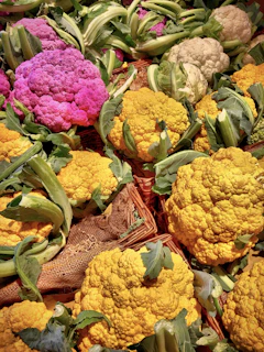 Bundles of recently harvested white cauliflower heads ready for market in Delhi