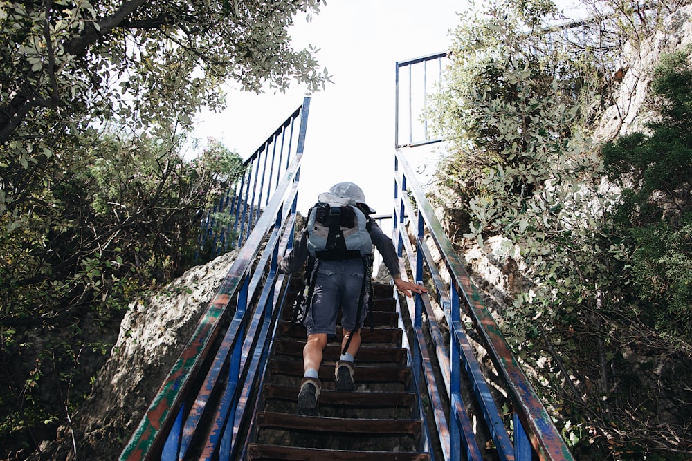 unknown person standing on stair outdoors