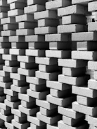 black and white photograph of a stack of bricks
