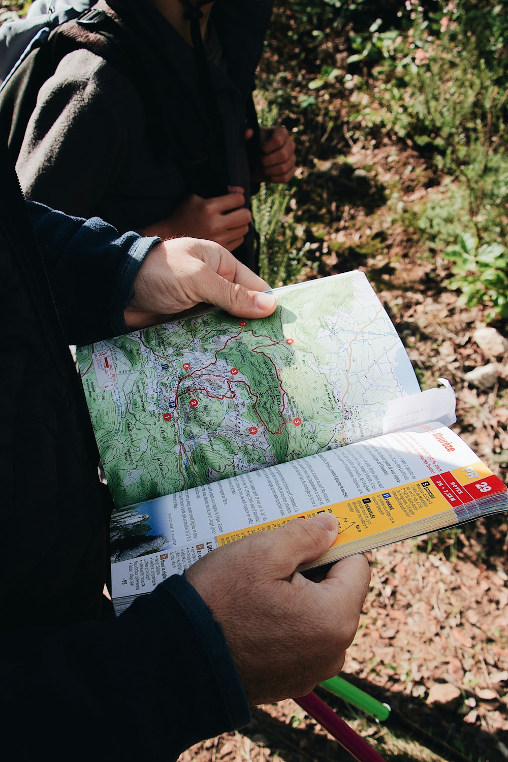 unknown person holding book