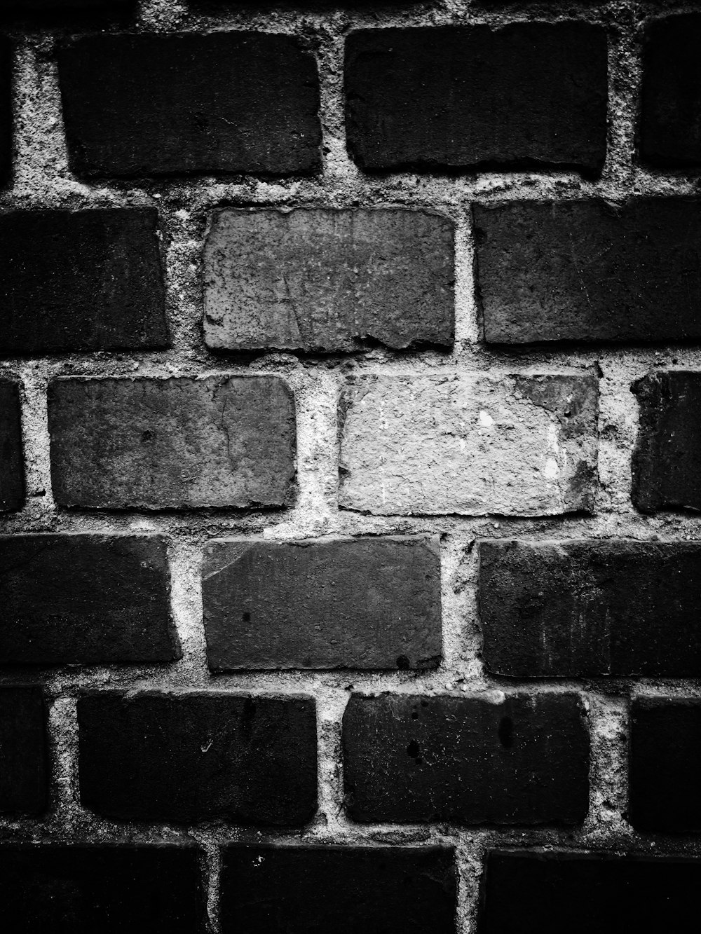 grayscale photography of a stonewall