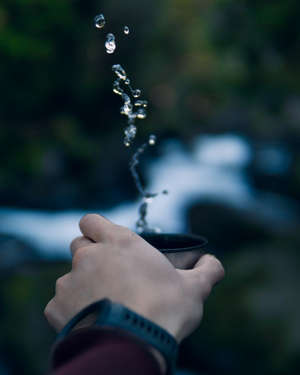 person holding drinking glass