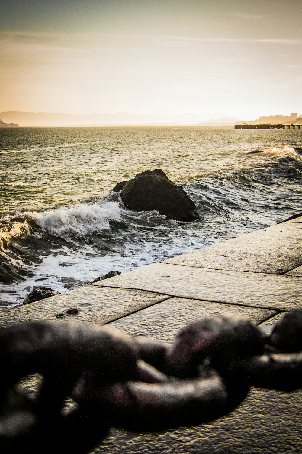 rock near body of water