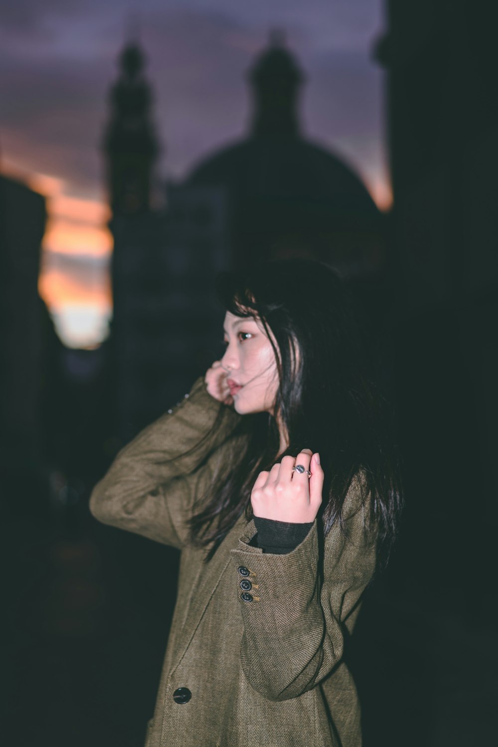 woman near building during golden hour