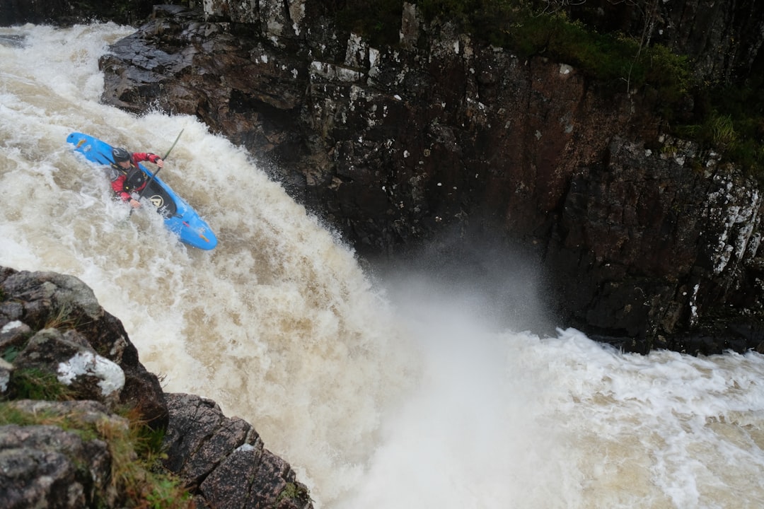 person kayaking on river, Kayaking down Right Angle Falls on the River Etive