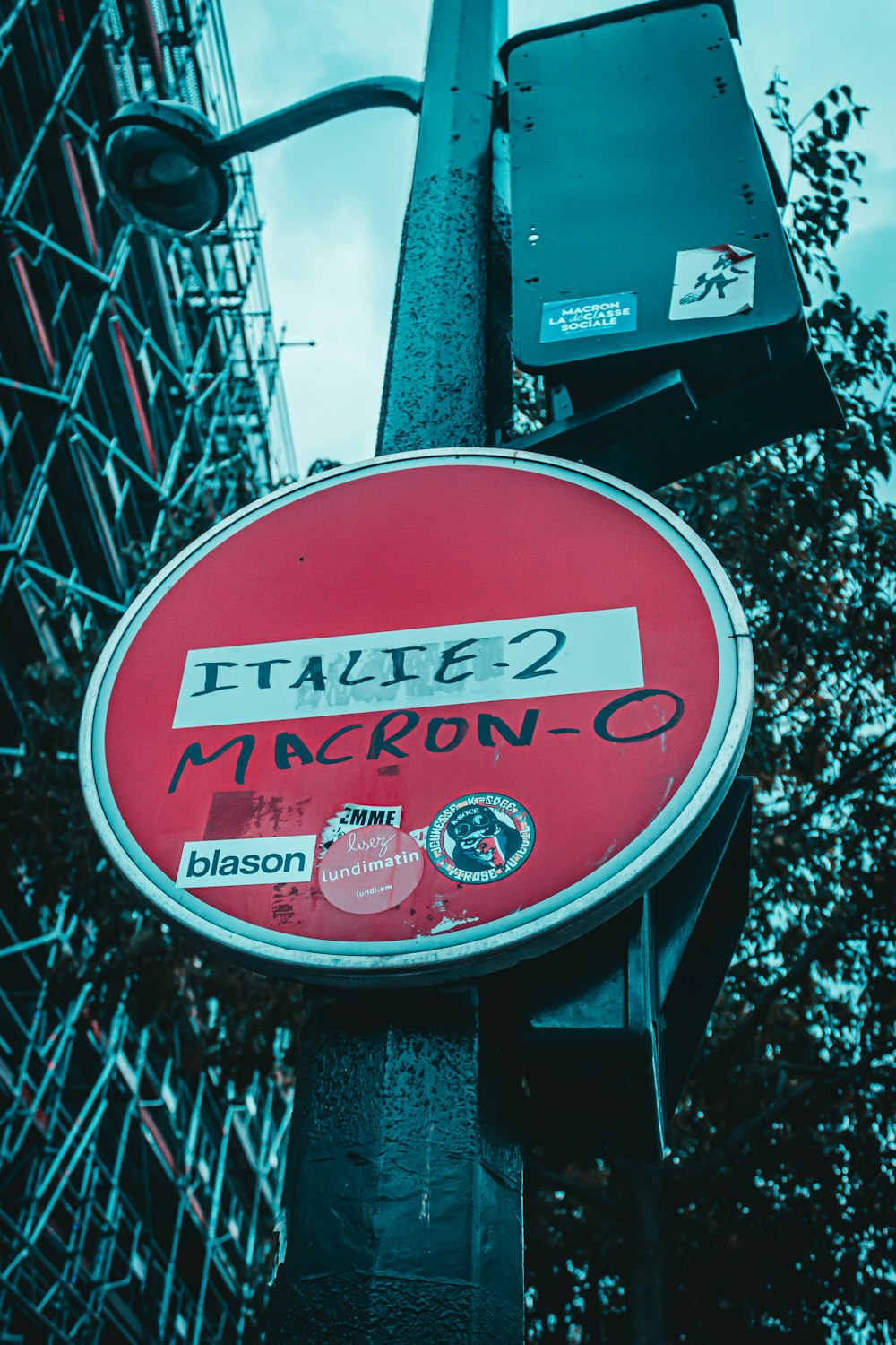 shallow focus photo of red signage