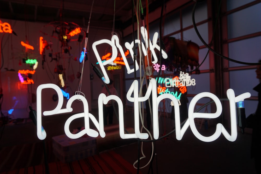 white pink panther neon sign