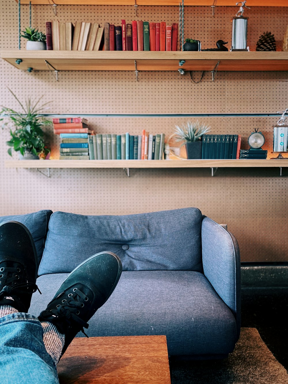 person sitting on sofa