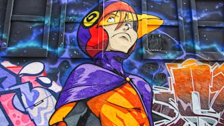 A vibrant street art mural featuring an anime-style character wearing a red and yellow cap, purple and orange clothing, set against a dynamic background of graffiti and cosmic elements.