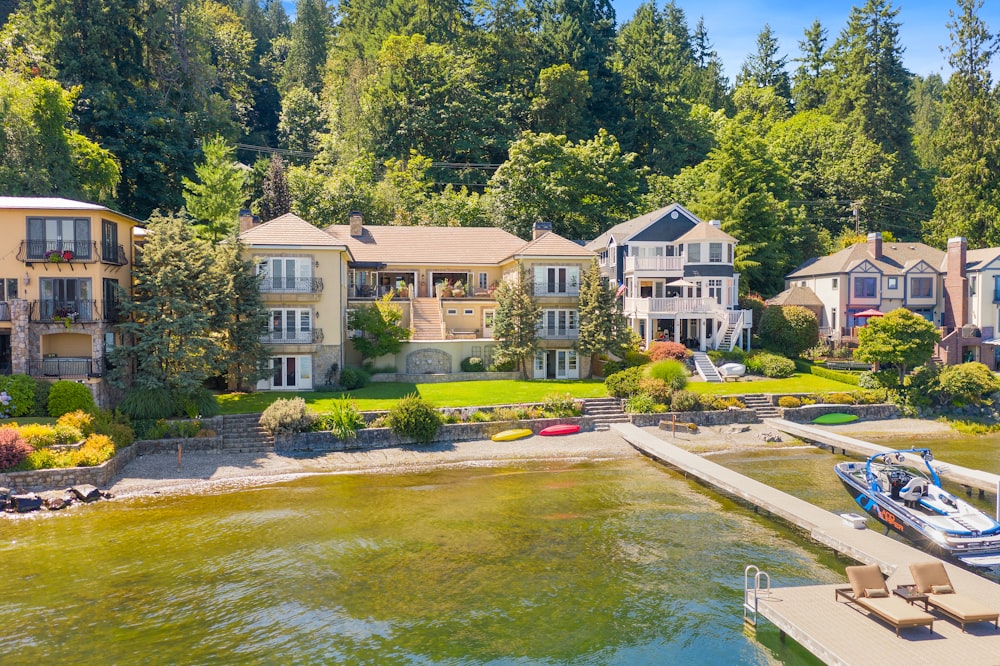 concrete house near body of water at daytime