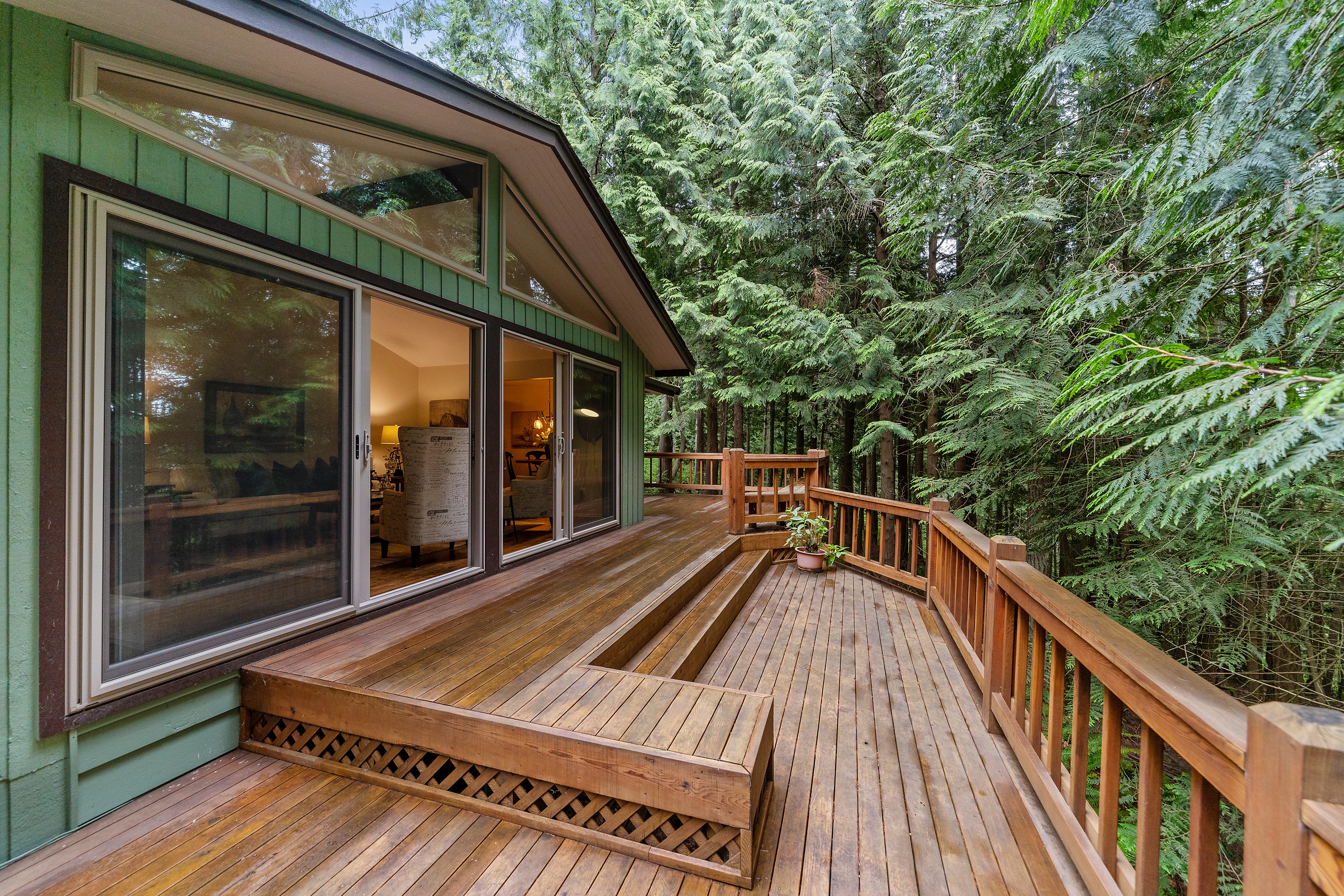 Wooden deck terrace outside a glass door