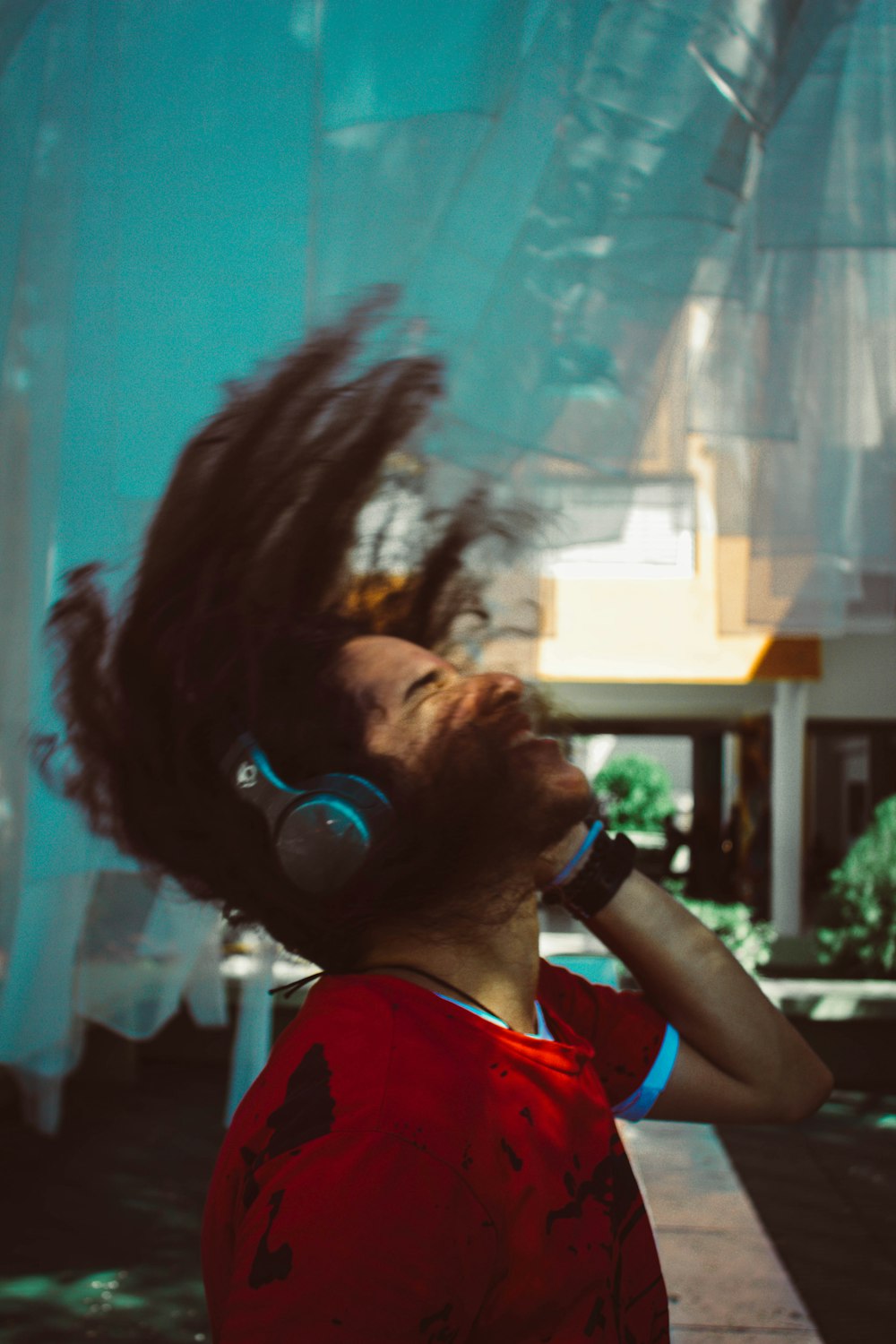 man in gray and blue headphones