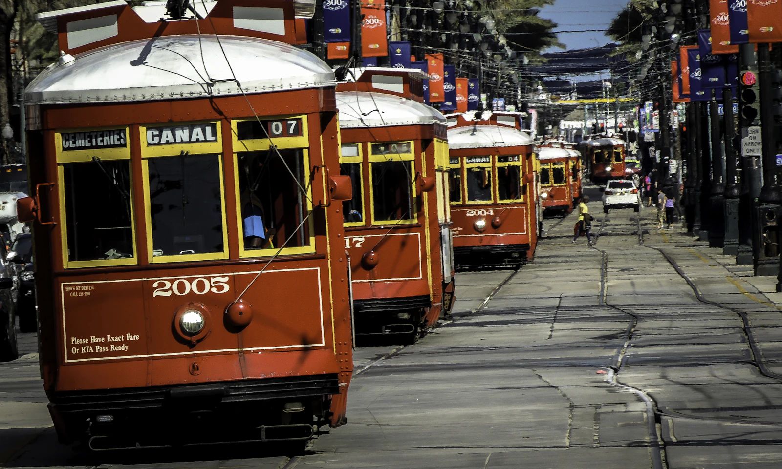 The red Canal Street streetcars lined up at the end of the line