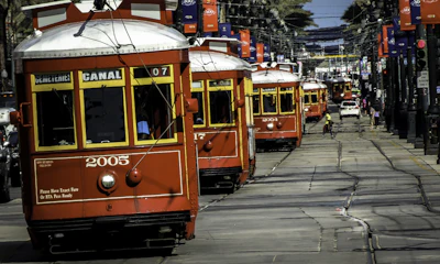 The red Canal Street streetcars lined up at the end of the line