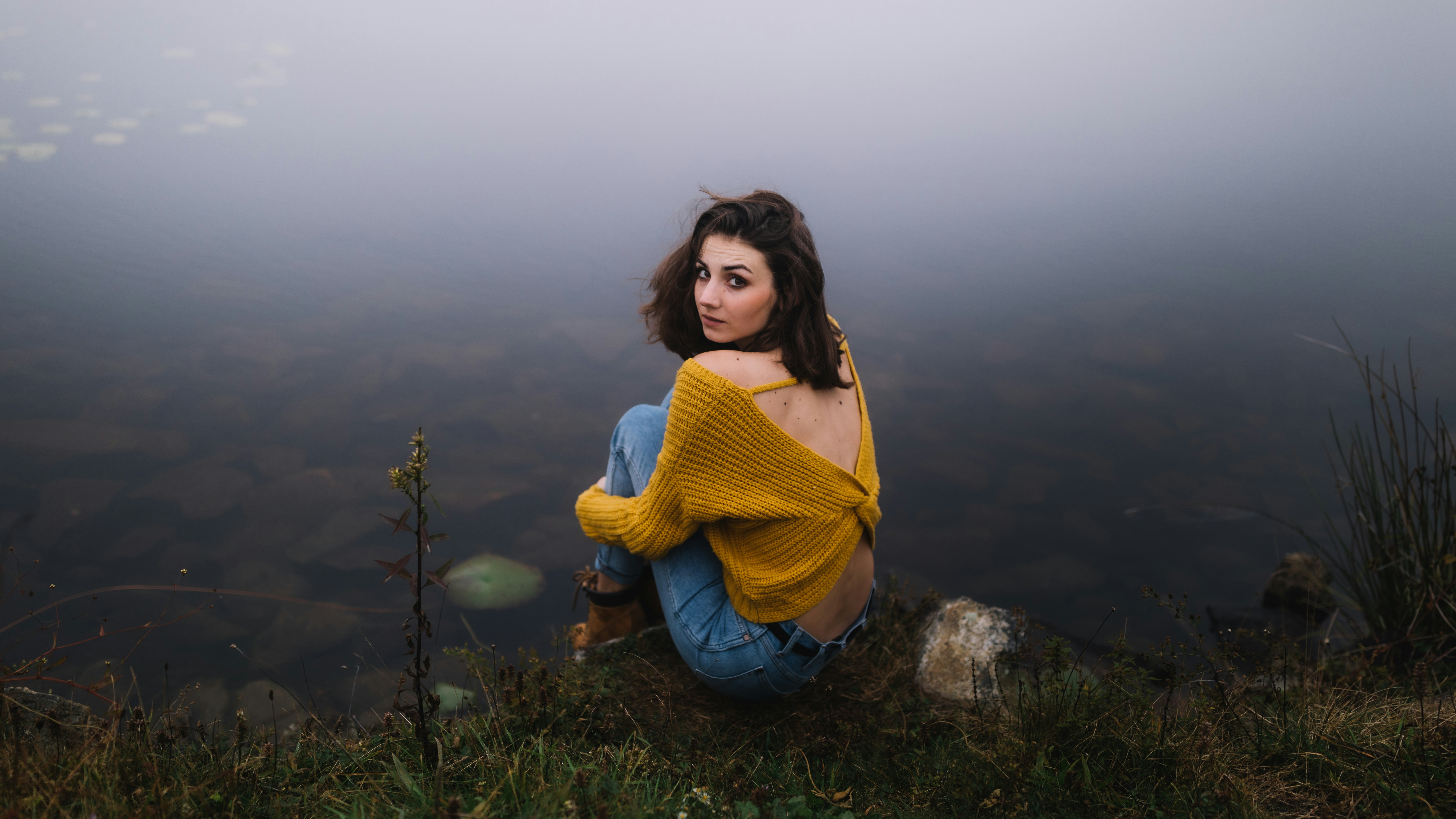 woman seating on peak