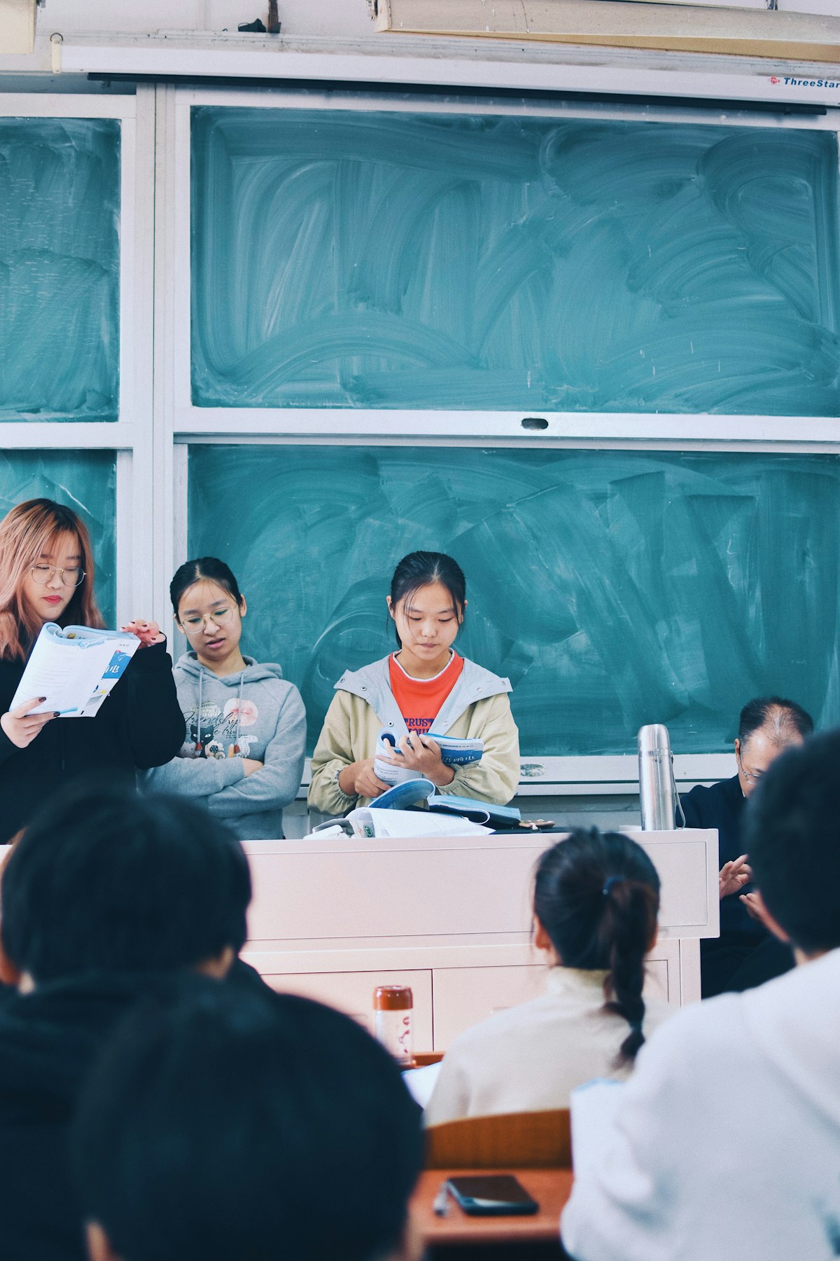 Language students in a classroom practicing with AI tools for foreign language teachers in 2026