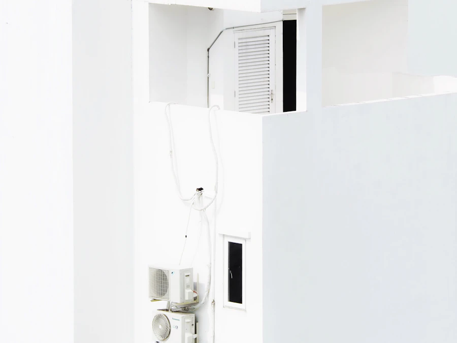 Wall mounted air conditioner in a white room