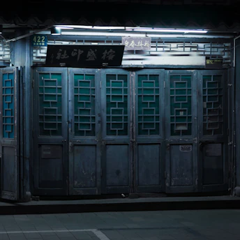 A faded and blurred close-up of a casino front door, hinting at mystery and caution.