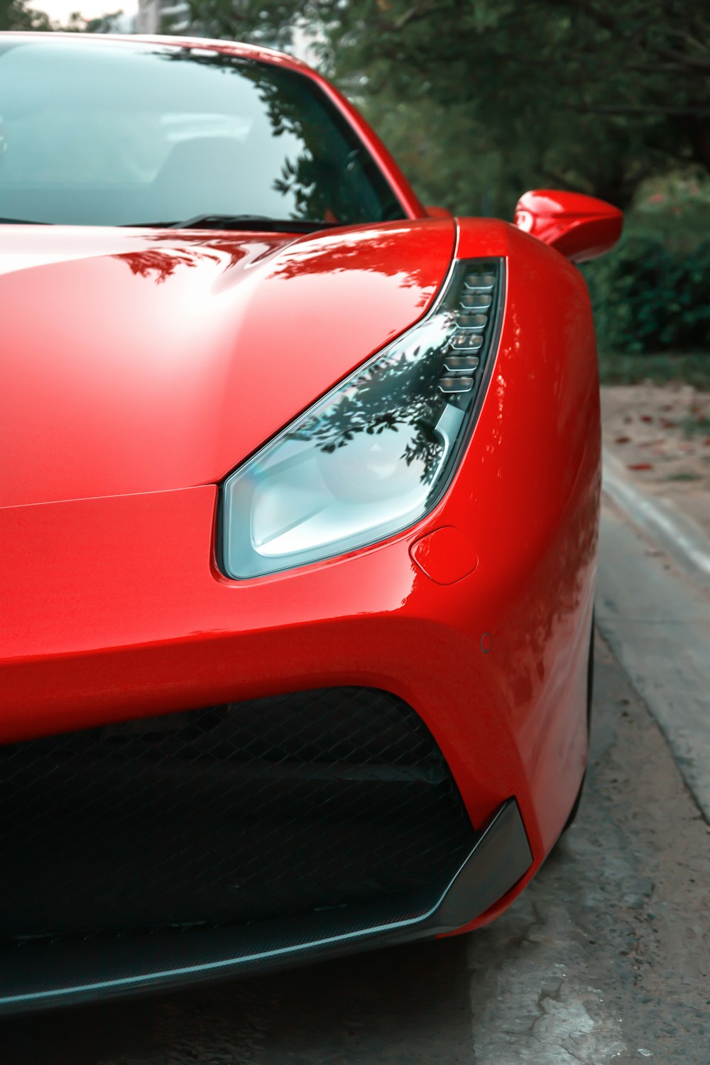 selective focus photo of red car