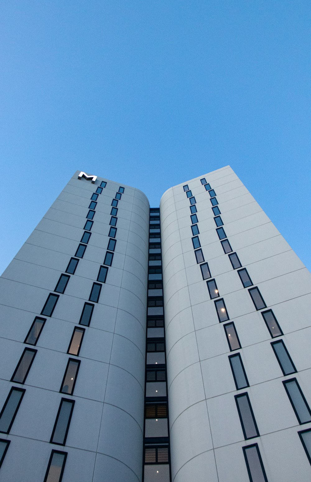 low-angle photography of grey building