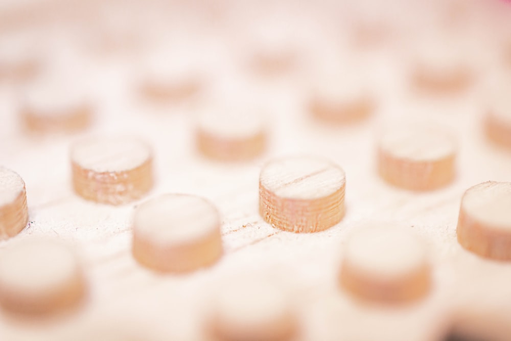 a close up of a bunch of pills on a table