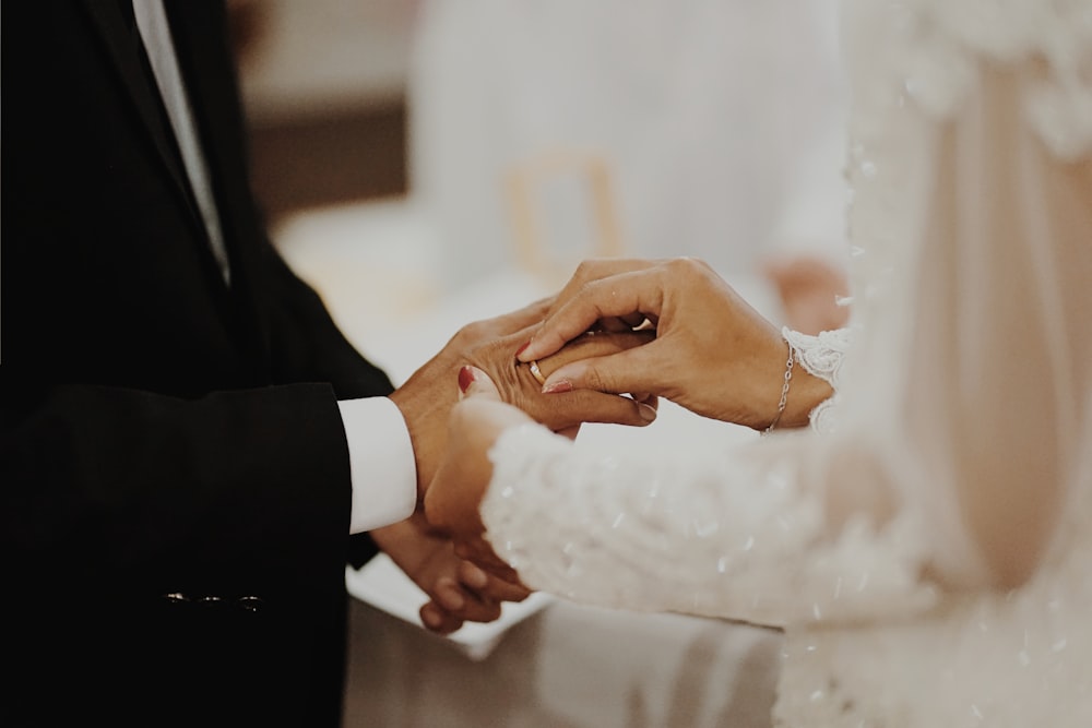 newly wed couple wearing ring