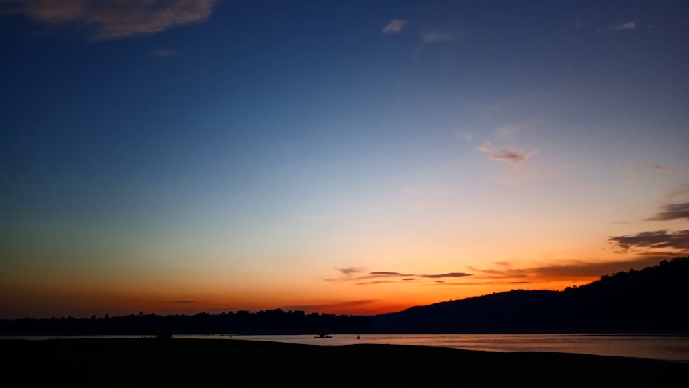 silhouette photo of sea