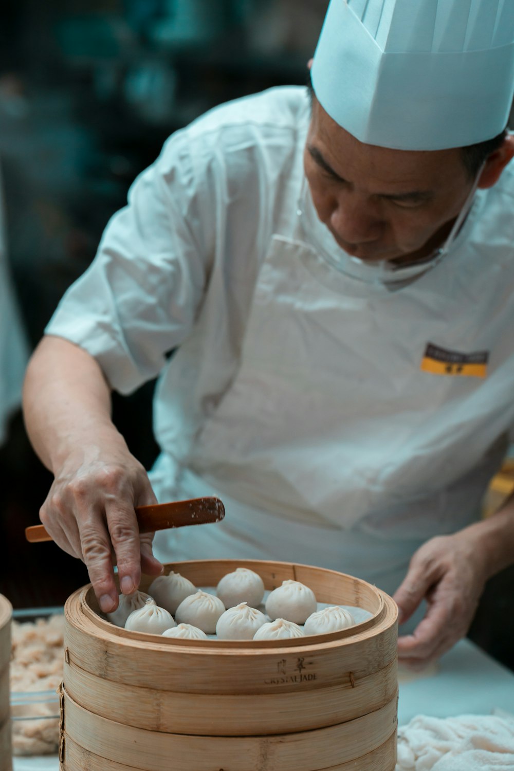 chef holding cooked food