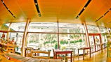 Cozy dining space with a large window offering natural light and lake view.