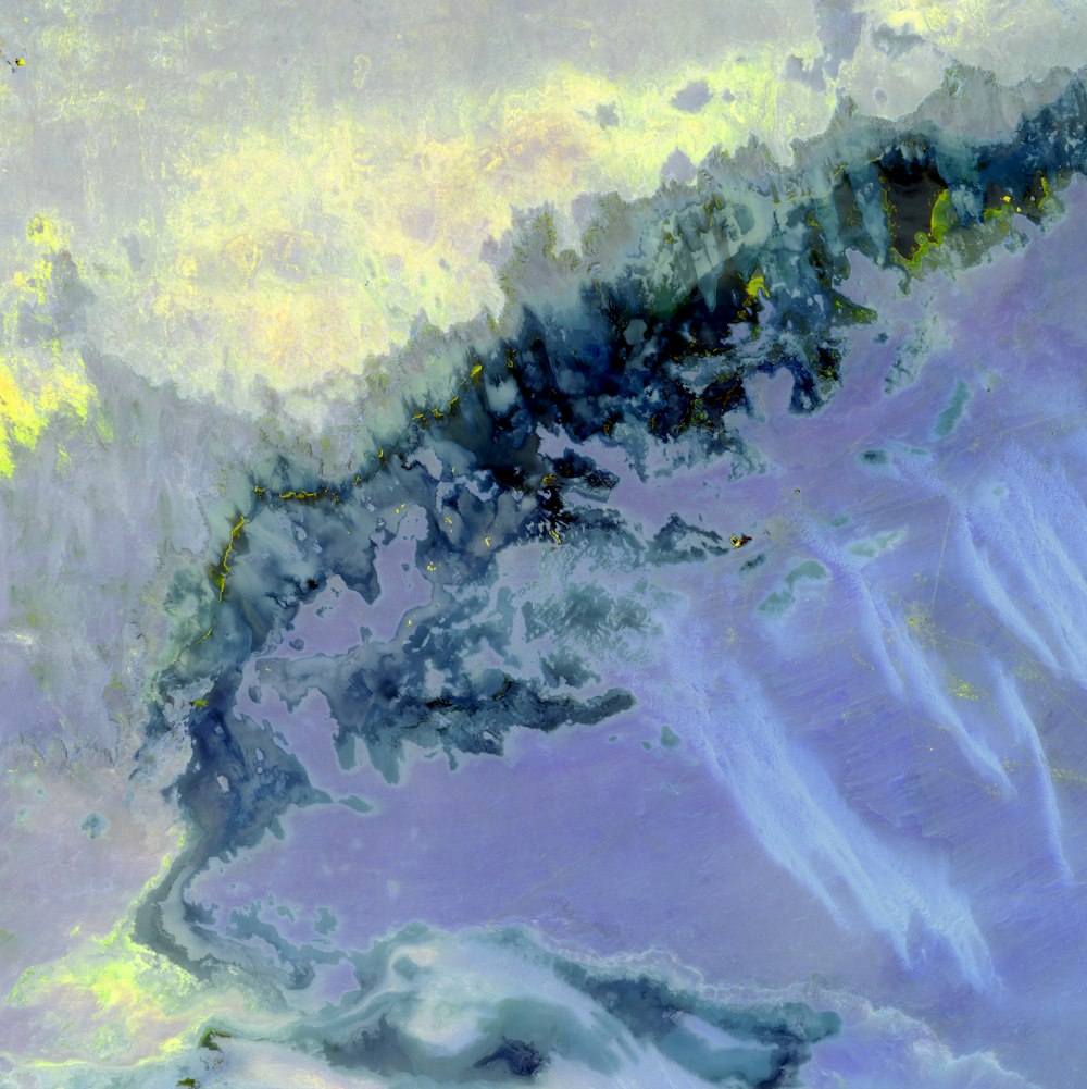 Una pintura de una ola en el océano