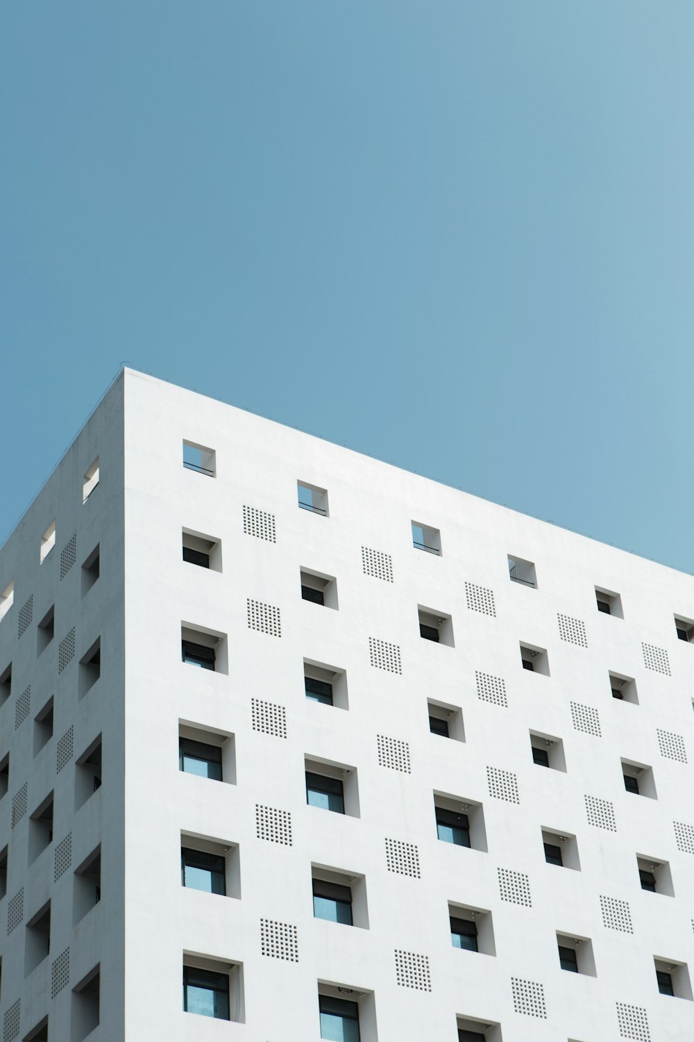 white-painted high-rise building