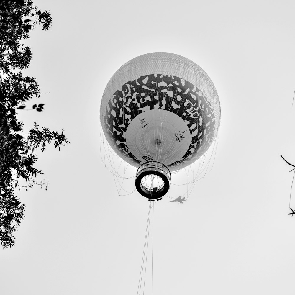 a hot air balloon is flying in the sky
