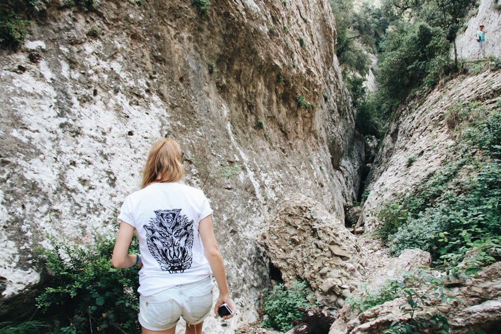 woman walking on pathway