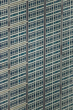 Detailed close-up of the building's exterior showing classic 1968 architecture.