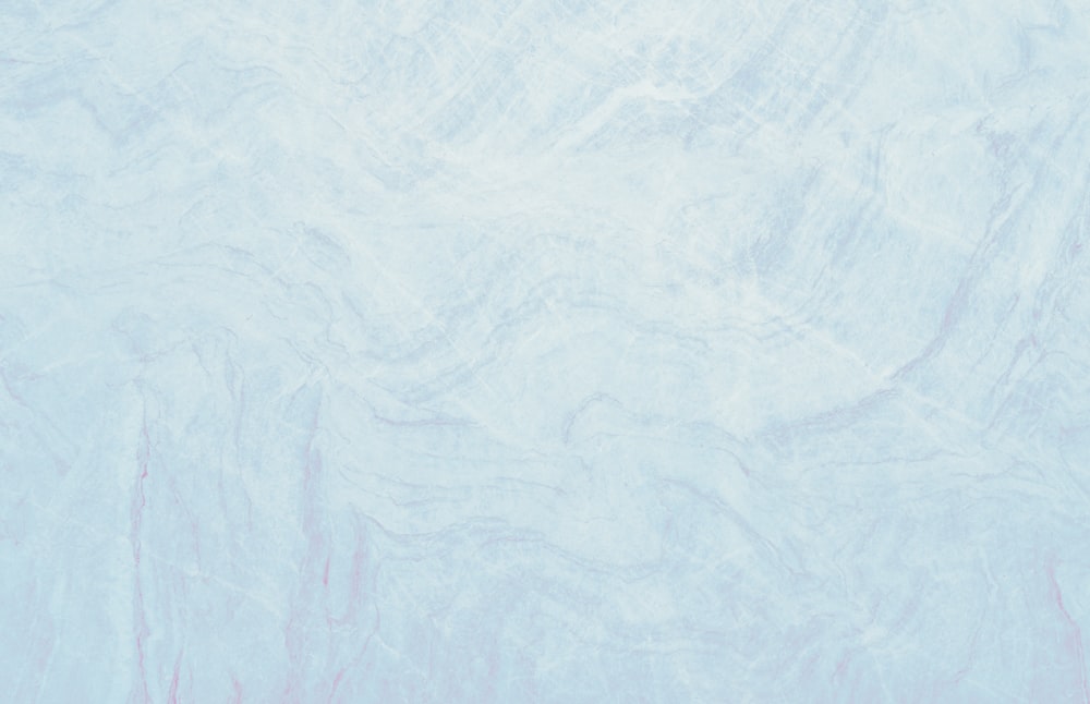 a blue and white marble textured background