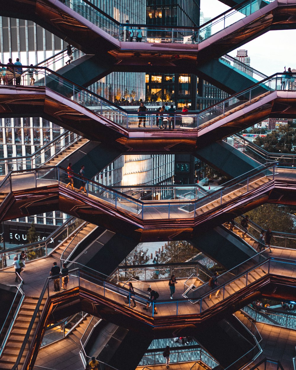 people around staircases of a high-rise building